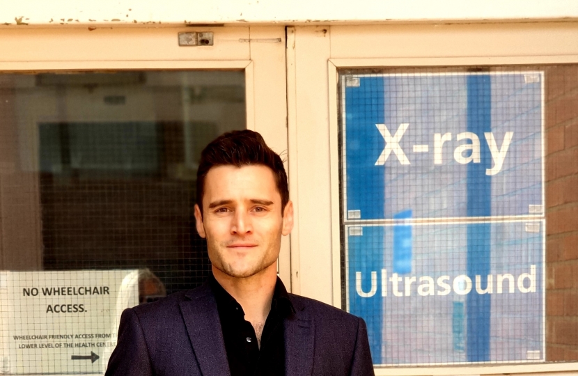 Dr Luke Evans Outside Mount Road X-Ray Department in Hinckley