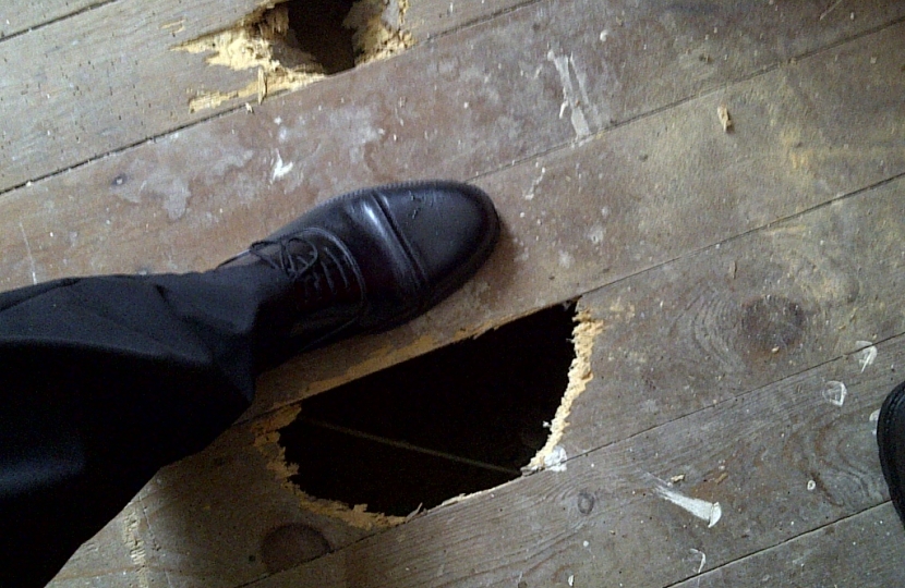 Another tenant says the property was let with this hole in the bedroom floor